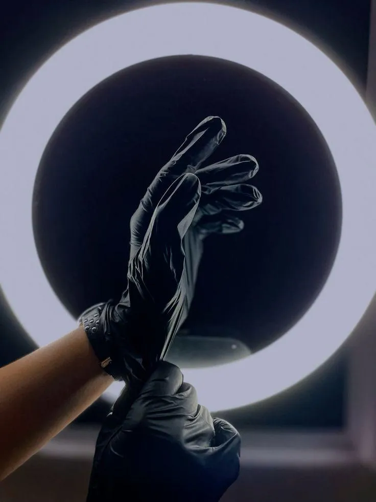 clear glass candle holder with brown liquid