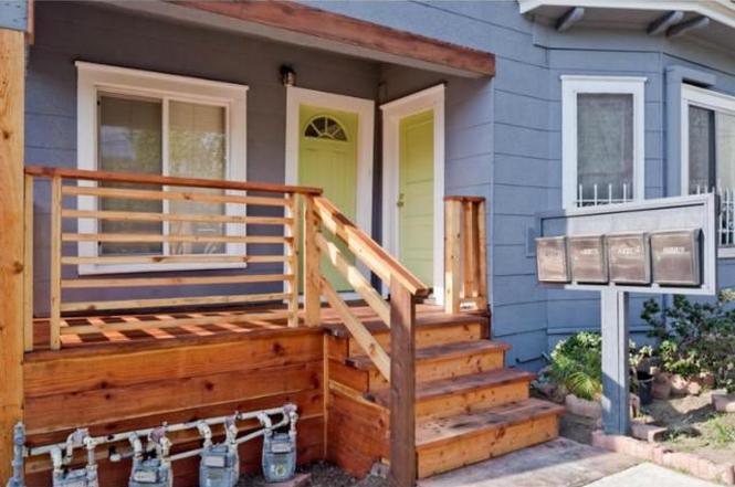 Echo Park Kent Street interior renovation with cozy living area and integrated shelving.