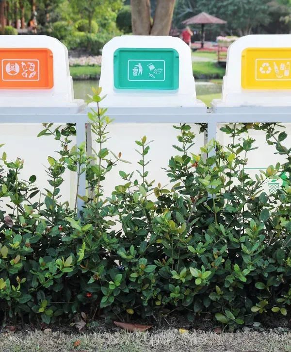 Dirty blue trash bin interior before professional cleaning showing grime and debris