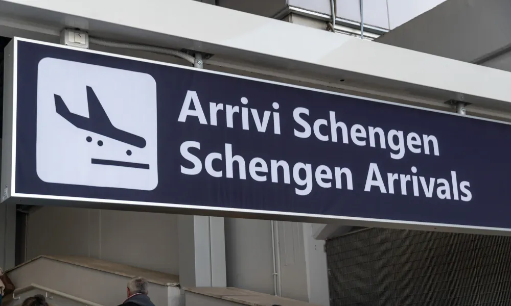 arrival sign for Schengen area passport control at a European airport