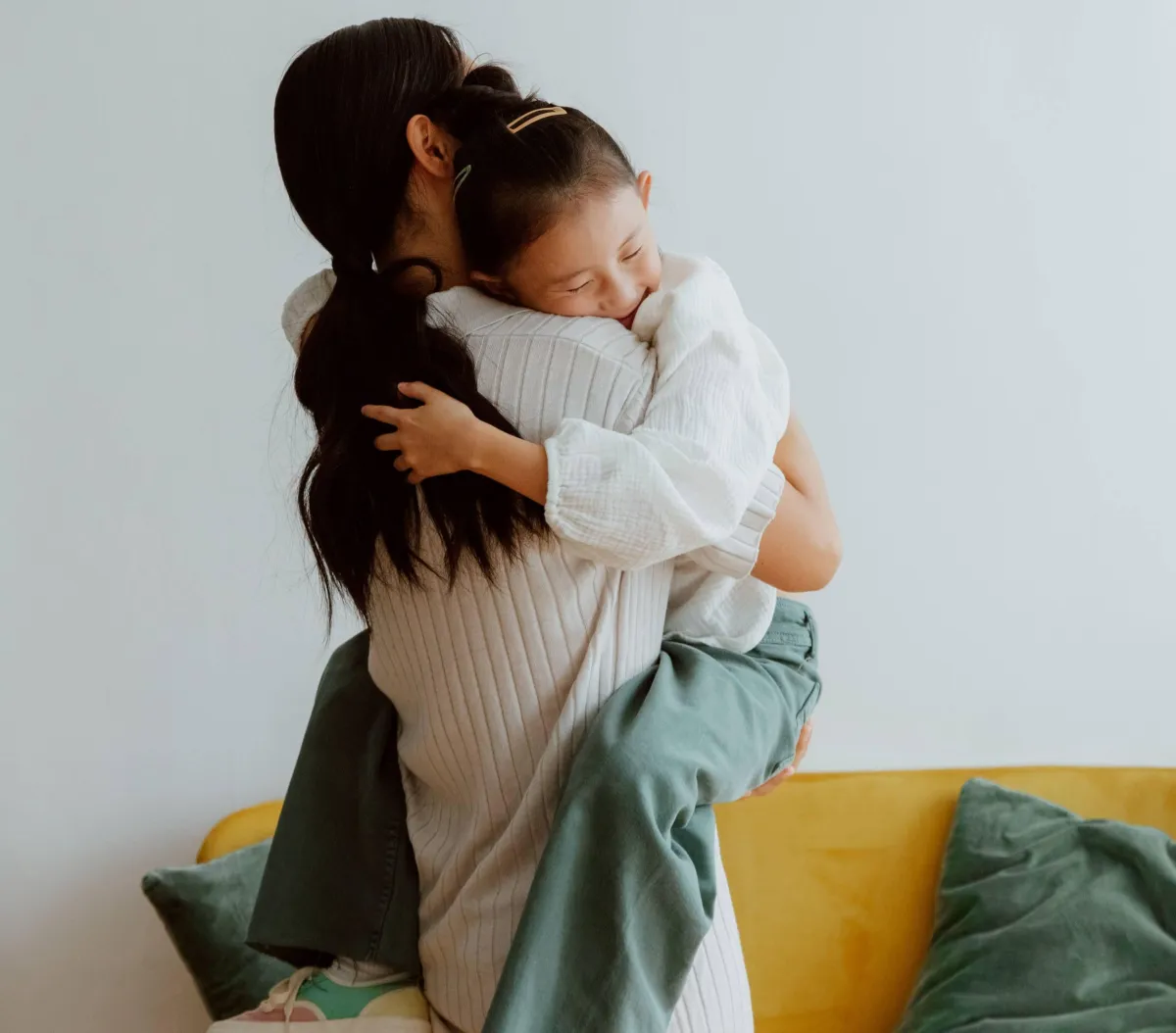Image depicting a mum supporting her child