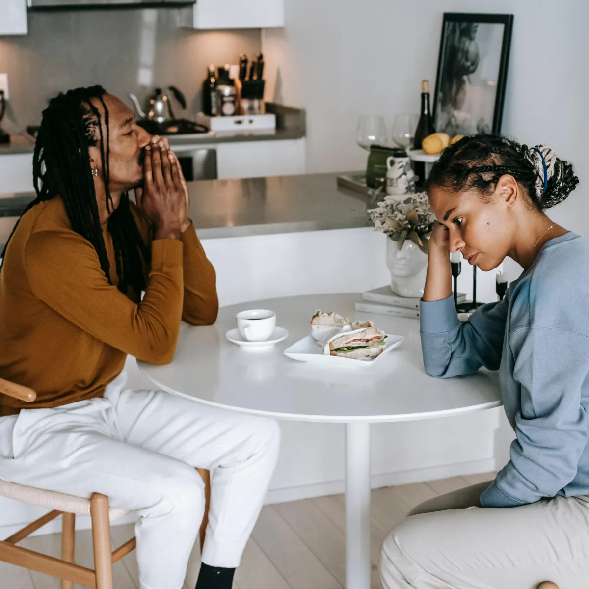 Image depicting a man and woman struggling with their relationship