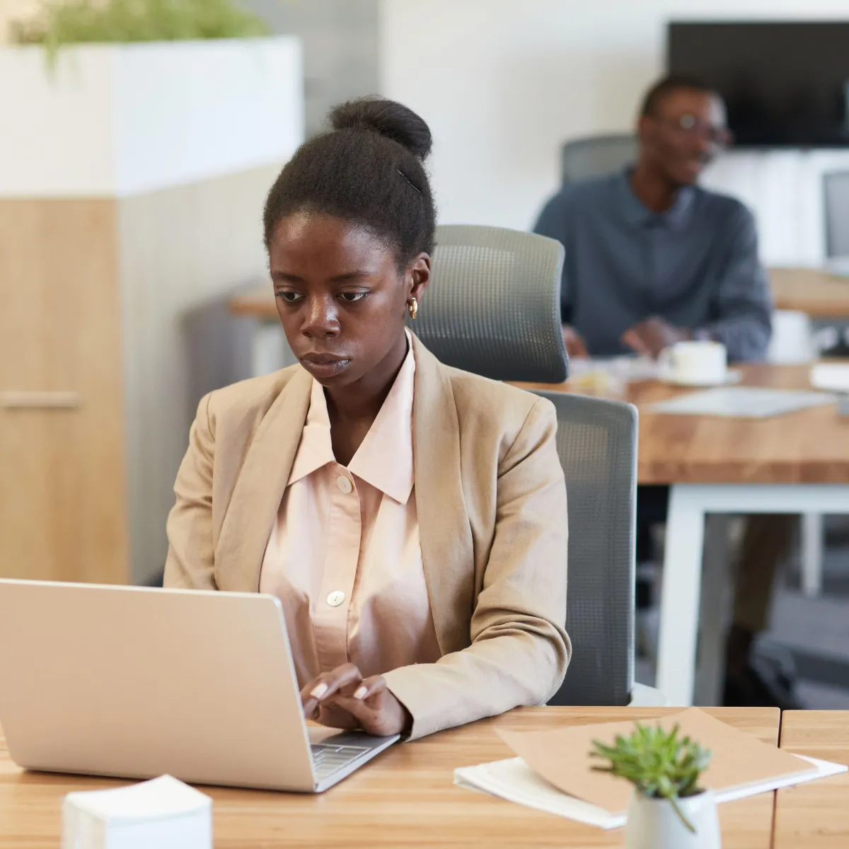 Image depicting a woman returning to work after maternity leave