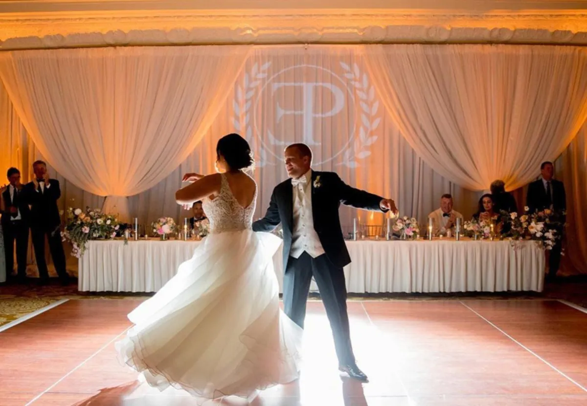 Bride and groom dancing with a Wedding DJ from Paradox Productions in Portland
