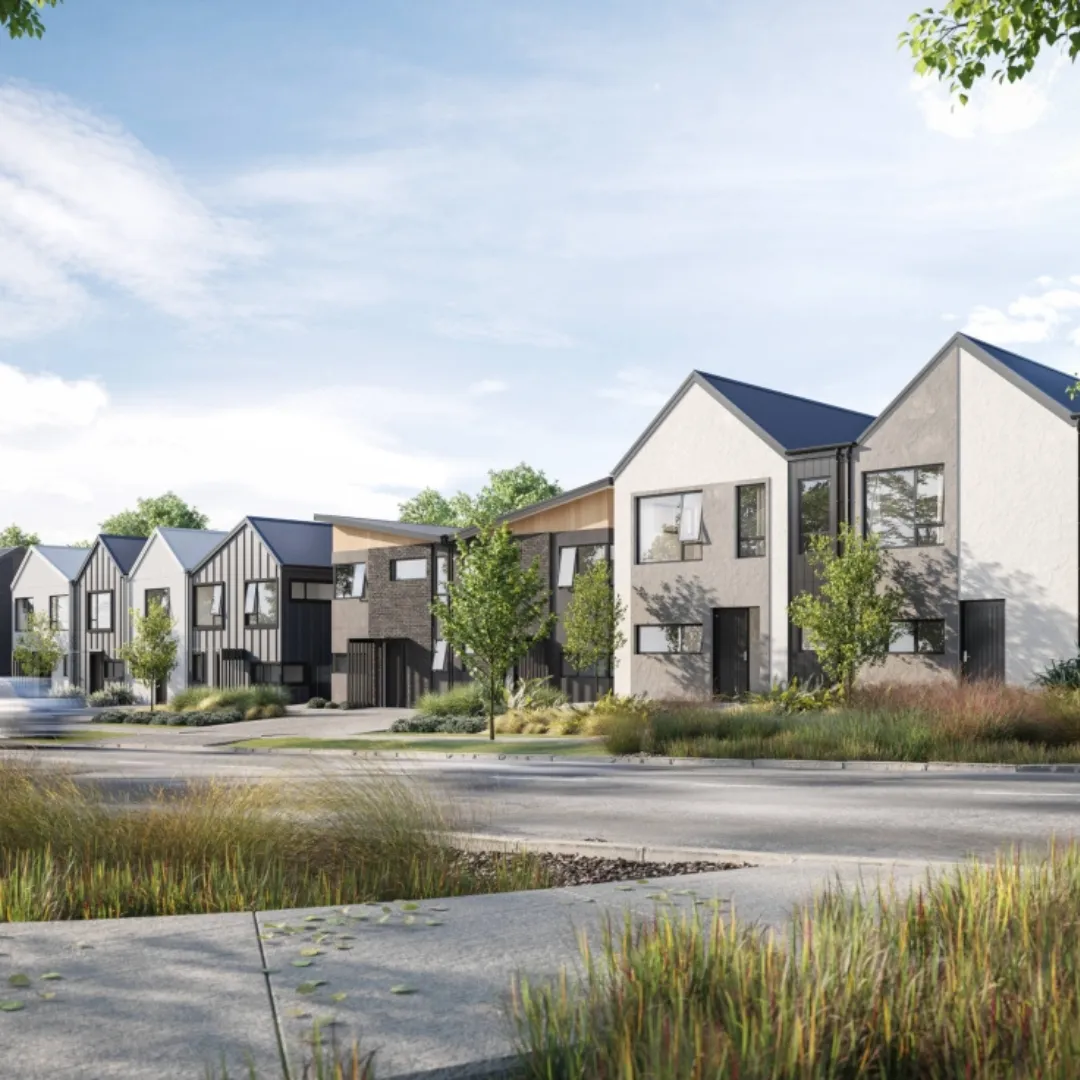 Modern row of newly built residential homes with landscaped front yards