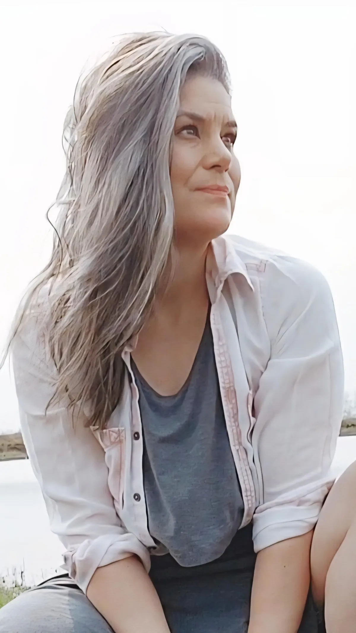 Warm and serene portrait of the wellness host and guide