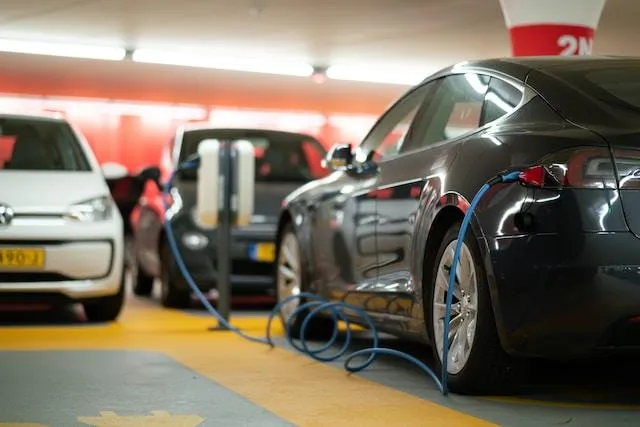 EV car being charger in commercial parking garage