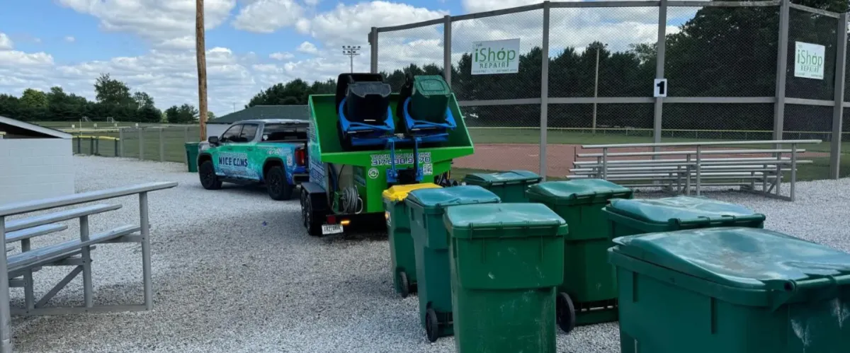 Trash can cleaning service performed at community park with multiple bins
