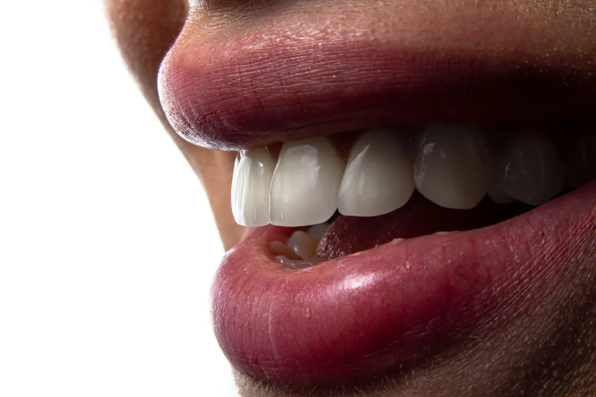 Smiling with teeth