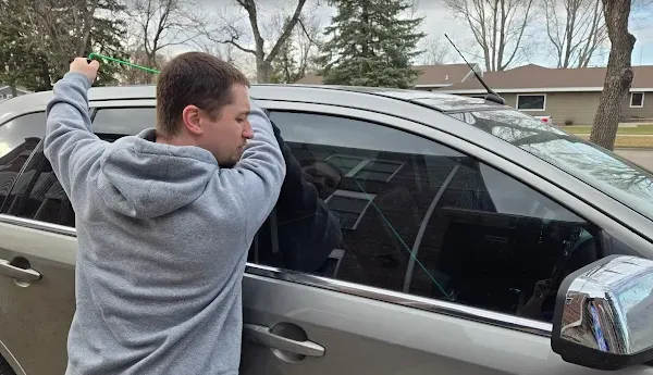 grand forks locksmith business owner kyle opening a locked car in grand forks nd 2025