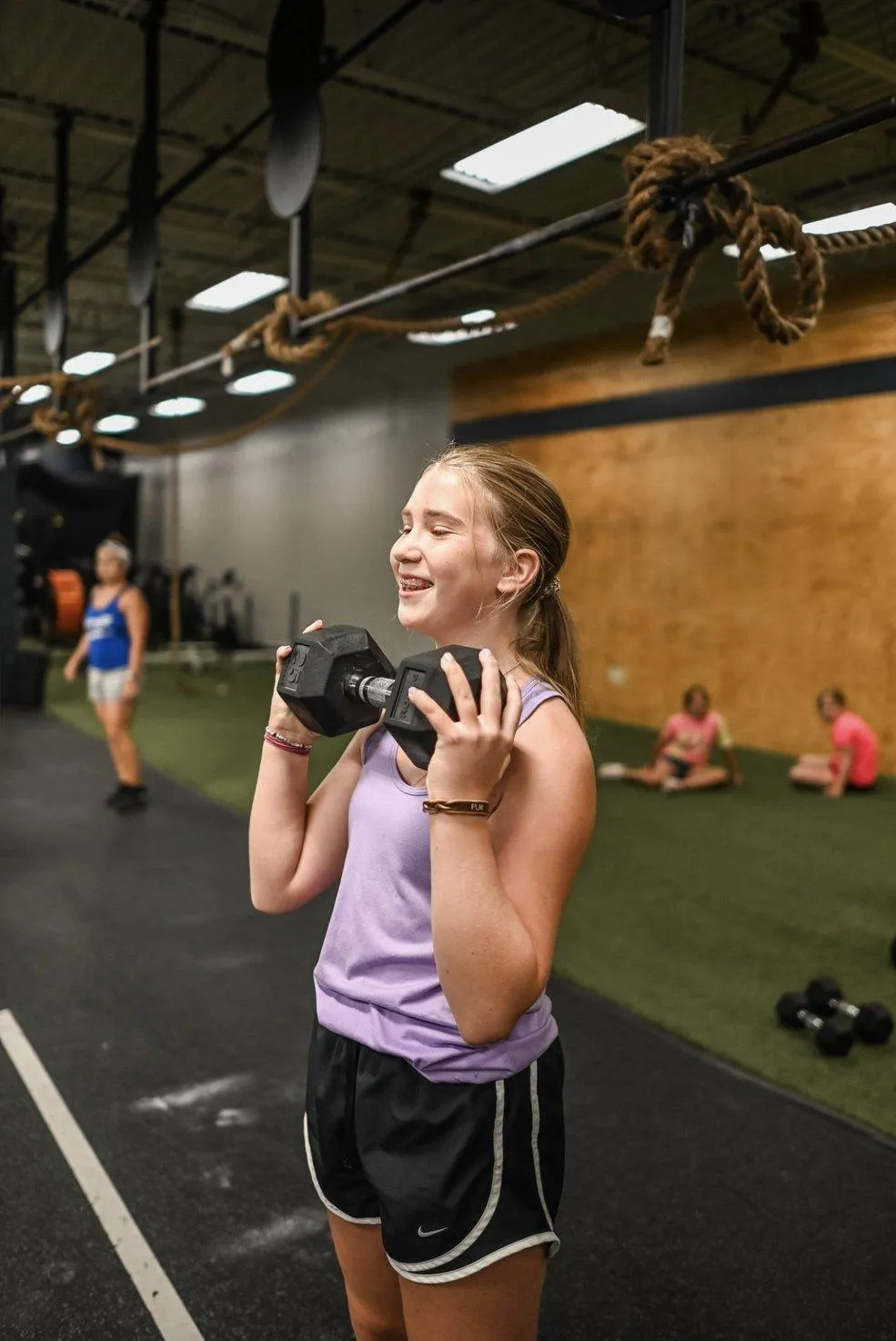 woman doing weight lifting