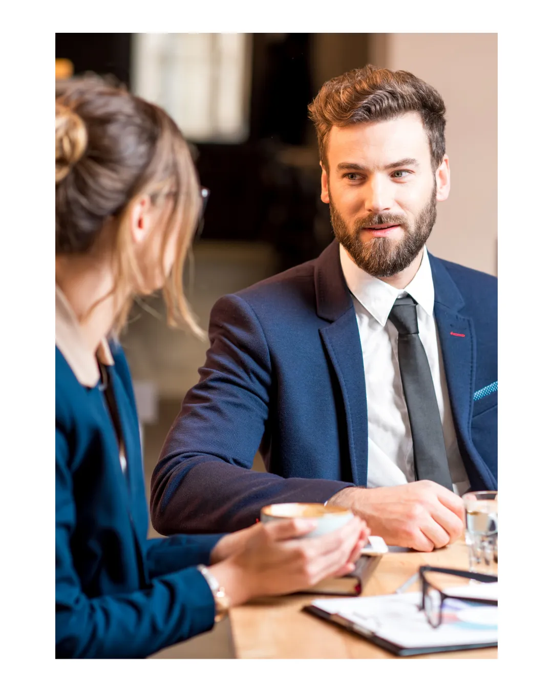 Business owner male meeting with female business manager