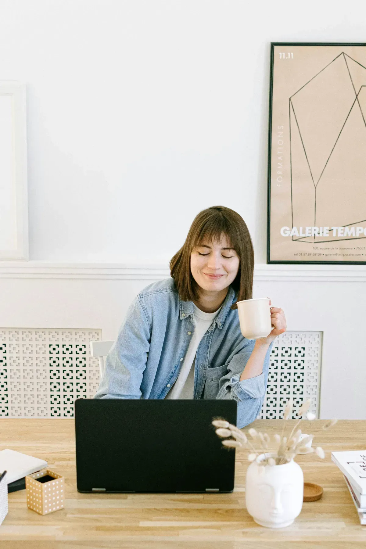 woman smiling working on computer