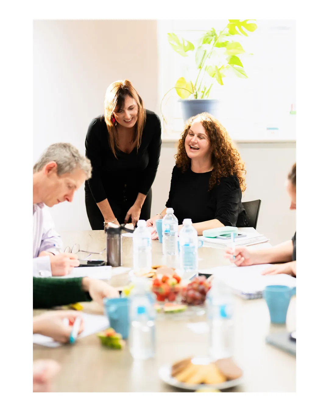 Lisa Tennant with a woman laughing