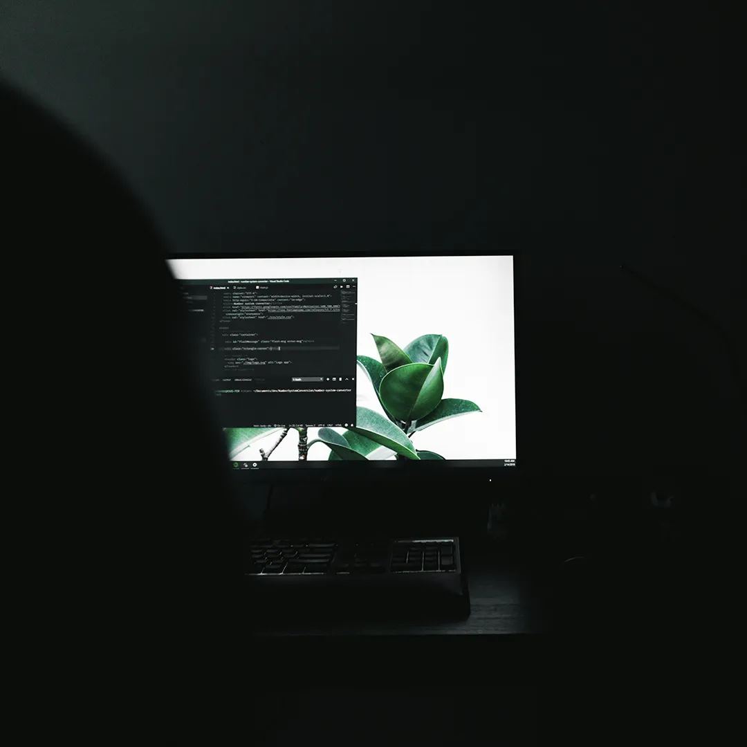 A picture of a computer up on an HTML document 
