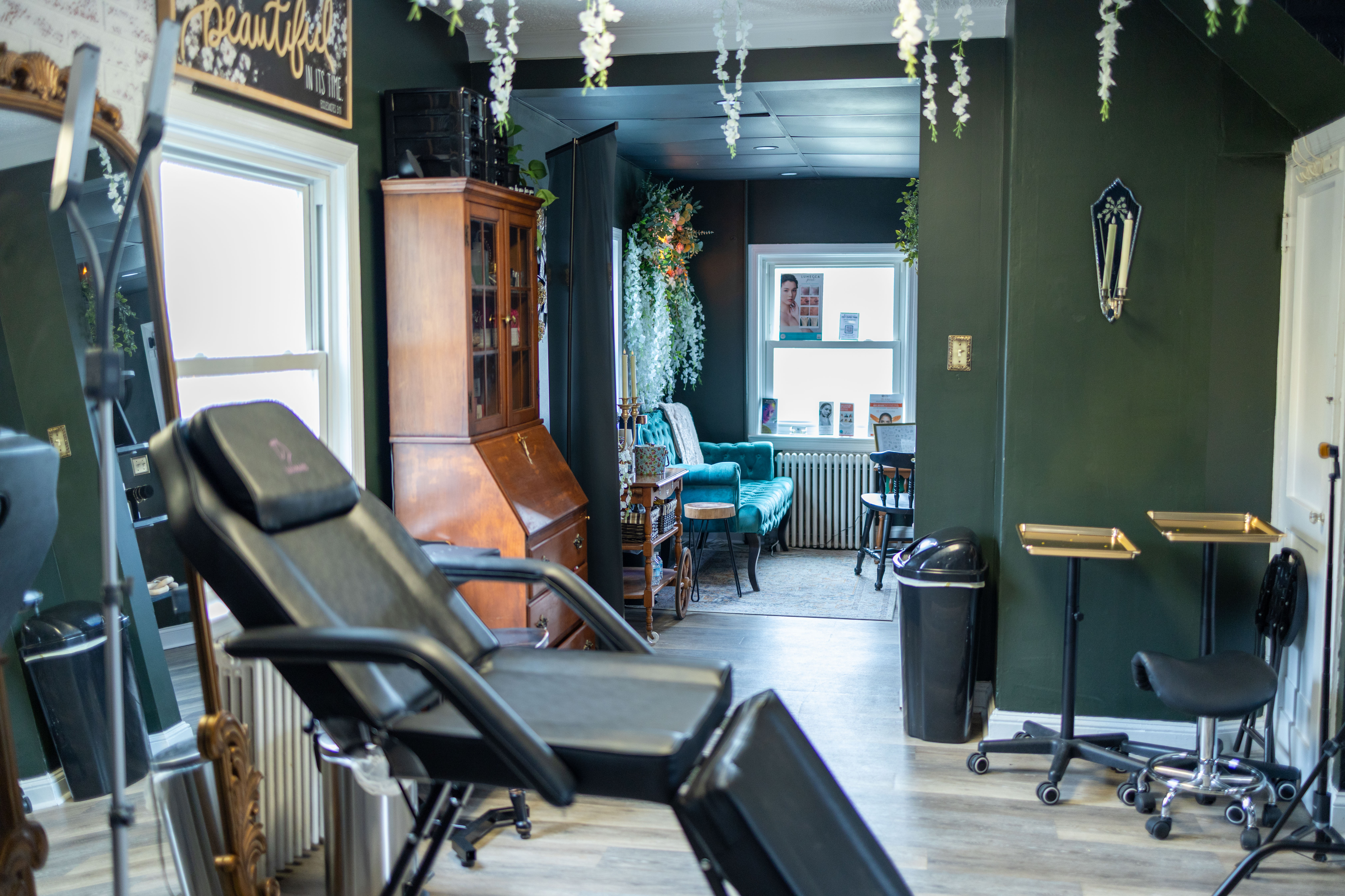 a hair salon with chairs and mirrors