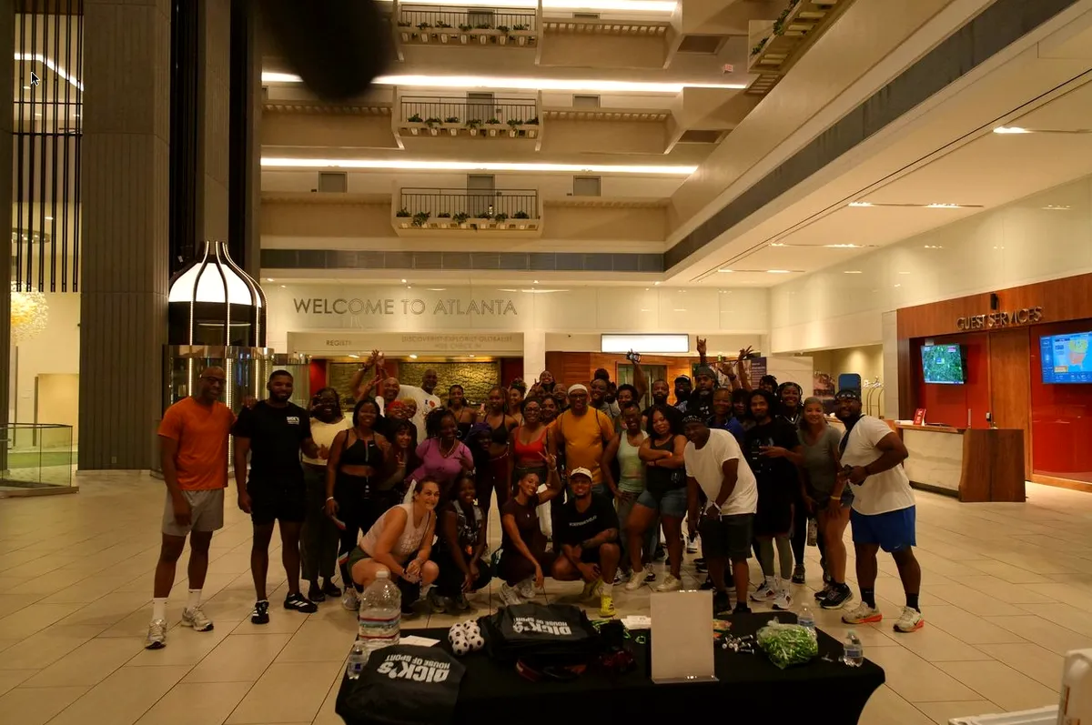 Volunteers packing healthy meal boxes for local families at community distribution centre