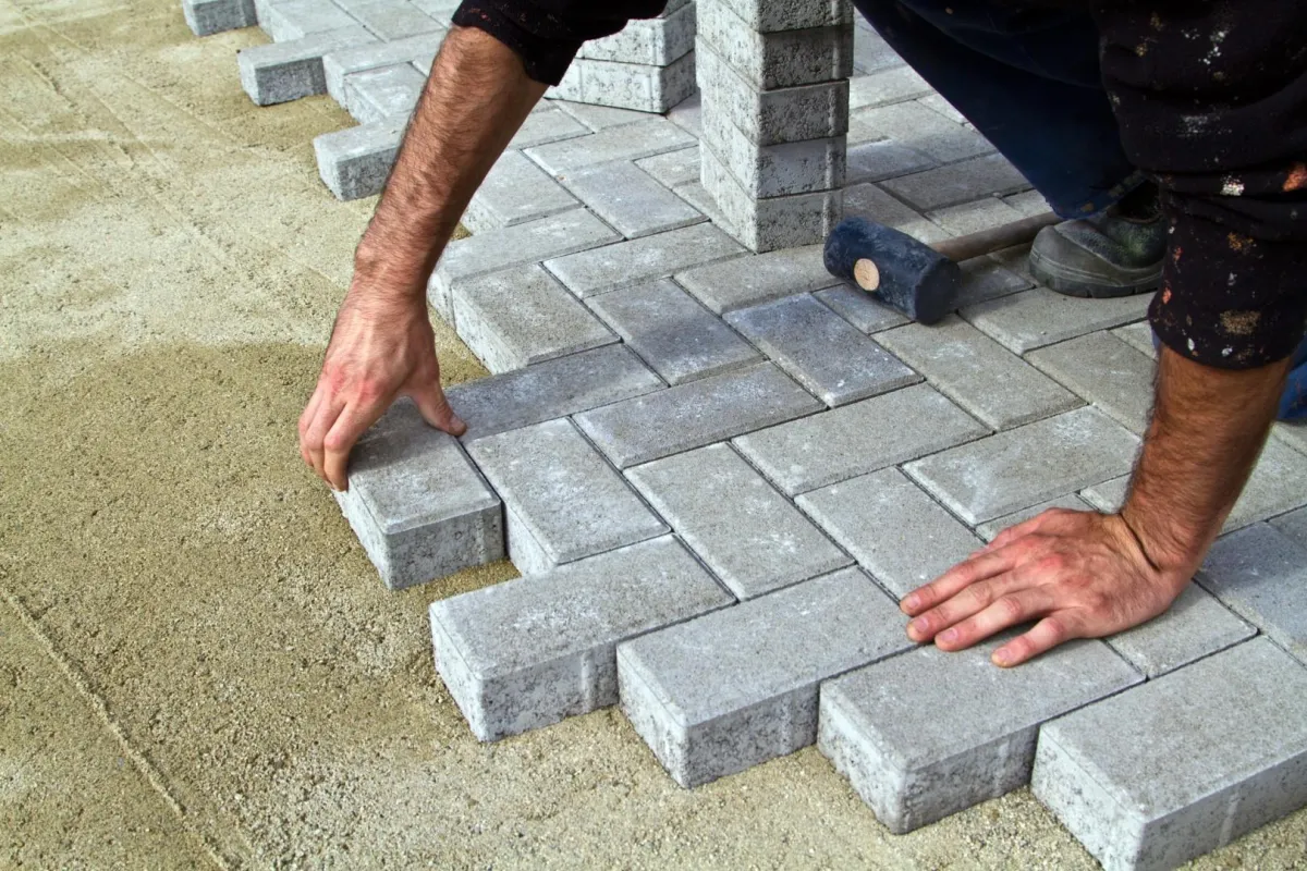 Installer adding a paver for a driveway Coral Springs, FL 