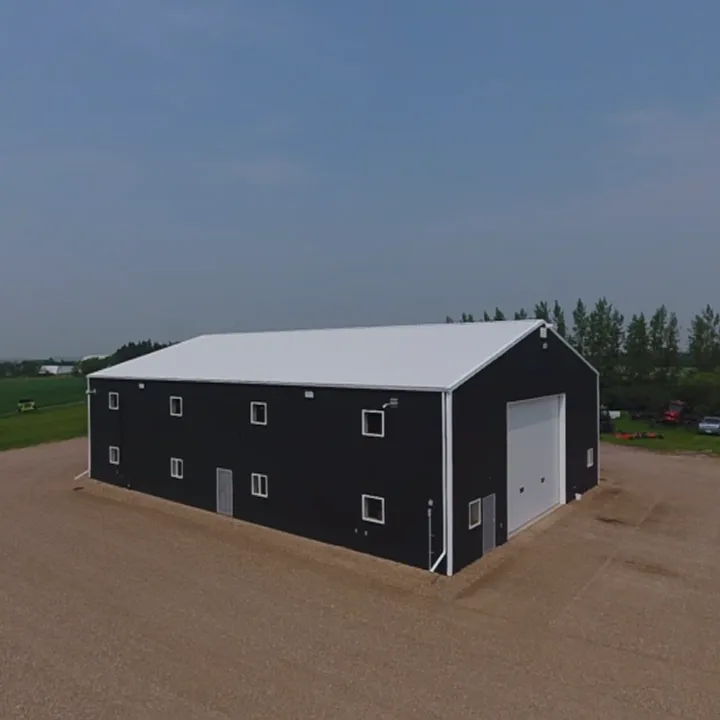 grayscale photo of man walking on road