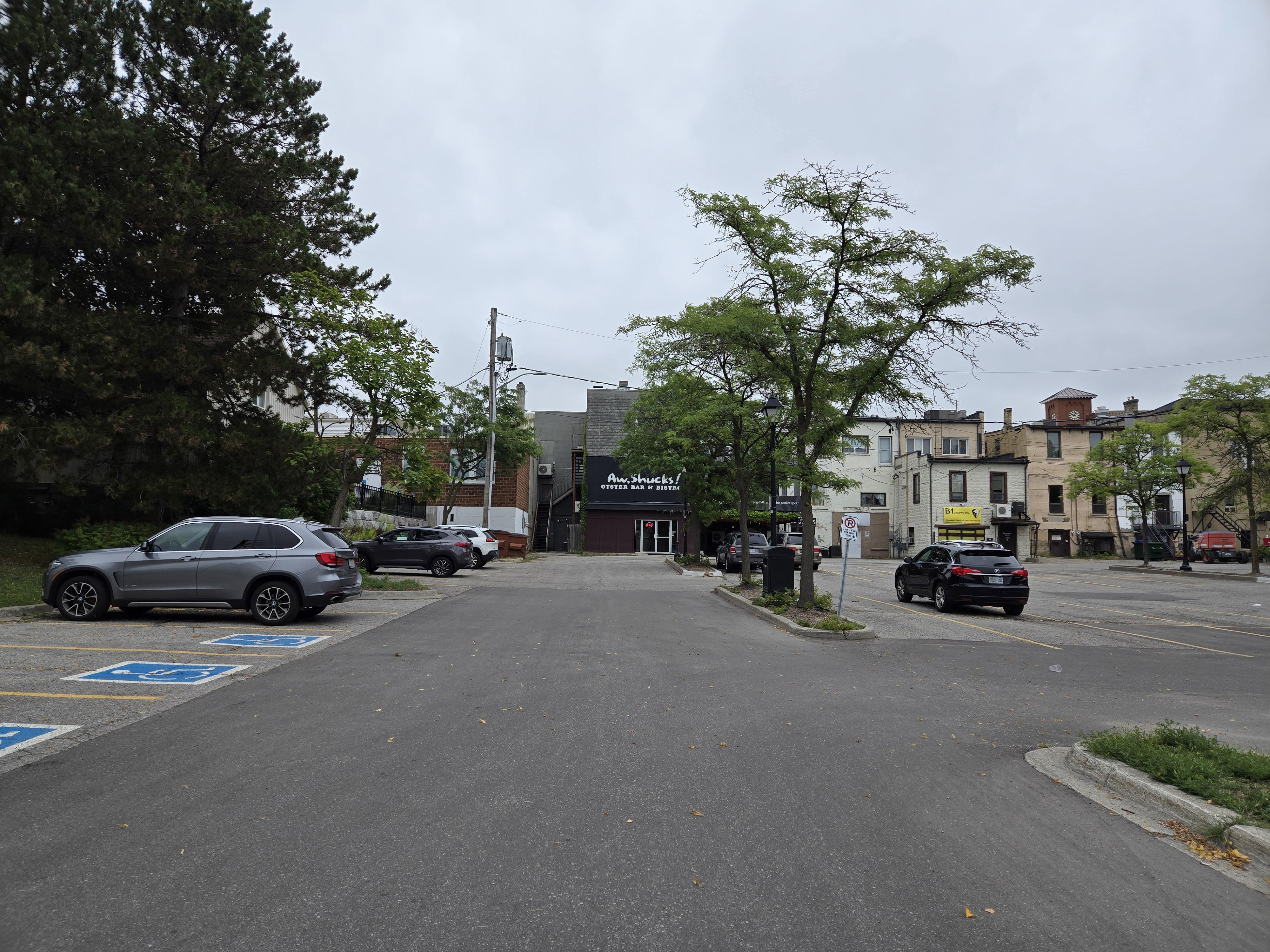 The public park lot behind Club X Indoor golf.