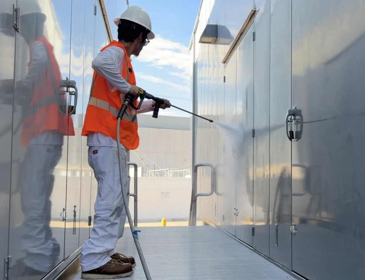 Industrial surface preparation and power washing by DL Coatings: generator degreasing, substrate prep, and durable industrial metal coatings.