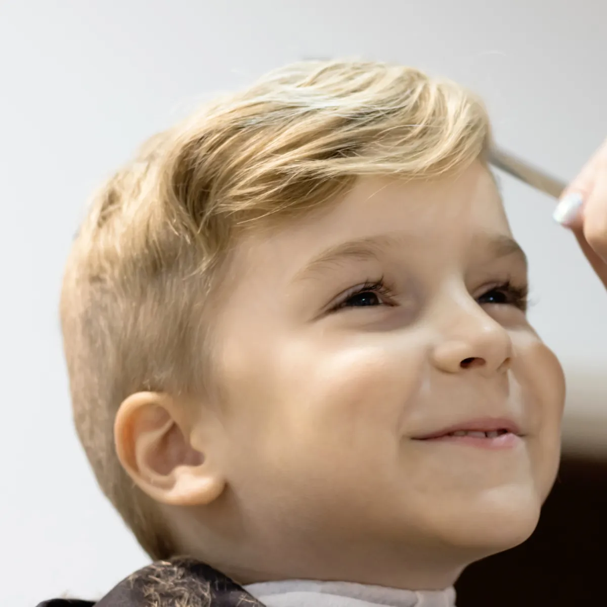 Child getting hair cut 