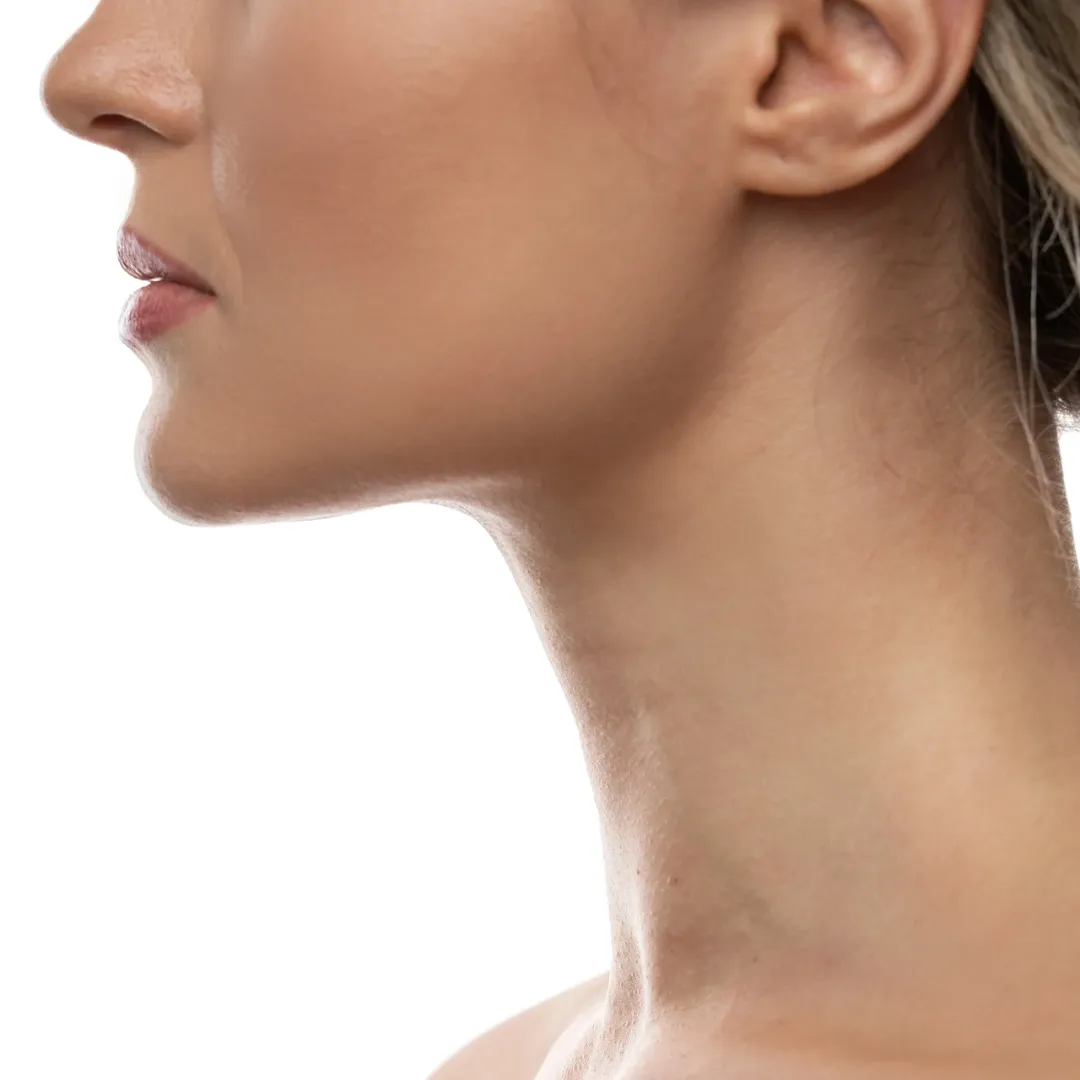 A close-up of a woman after receiving a professional chin waxing treatment