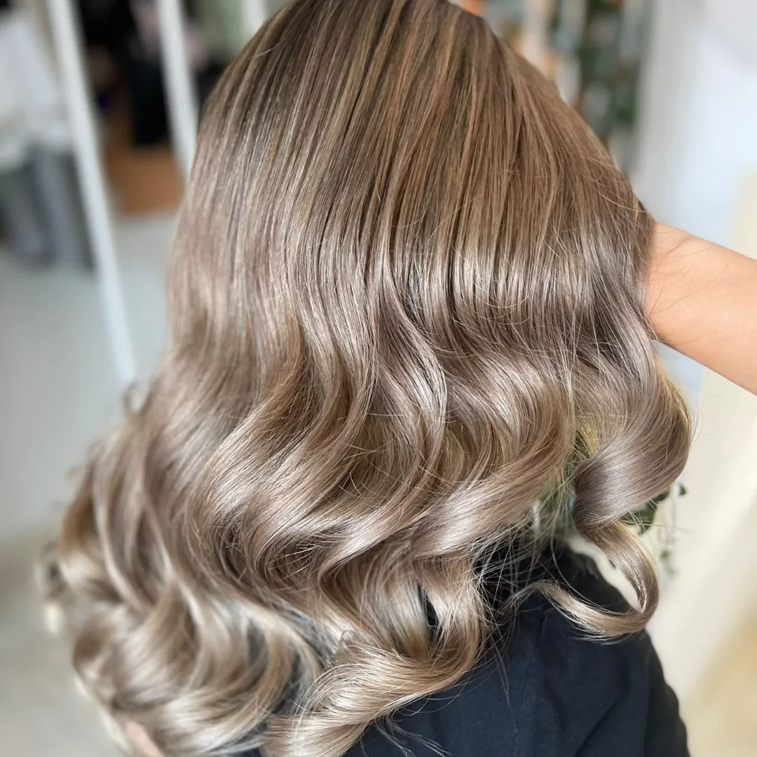 Balayage hair color with soft blended highlights