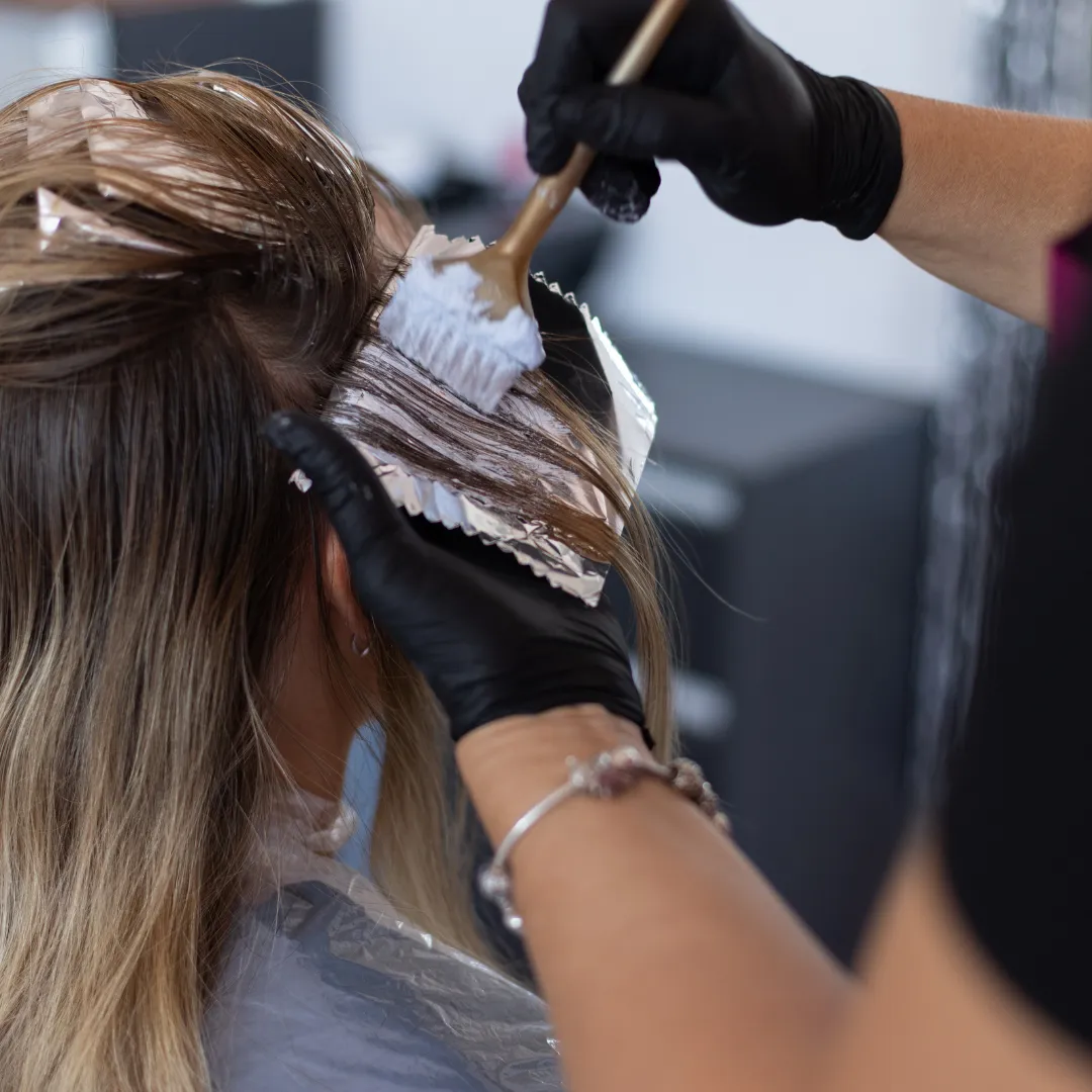 Balayage hair color with soft blended highlights