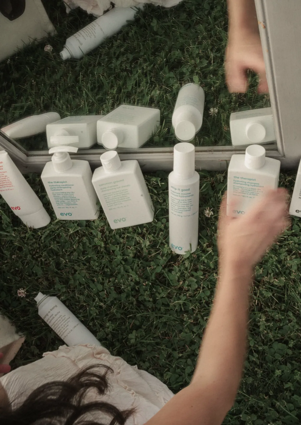Hair care products displayed on shelves at Zoe Zimmerman Hair Salon