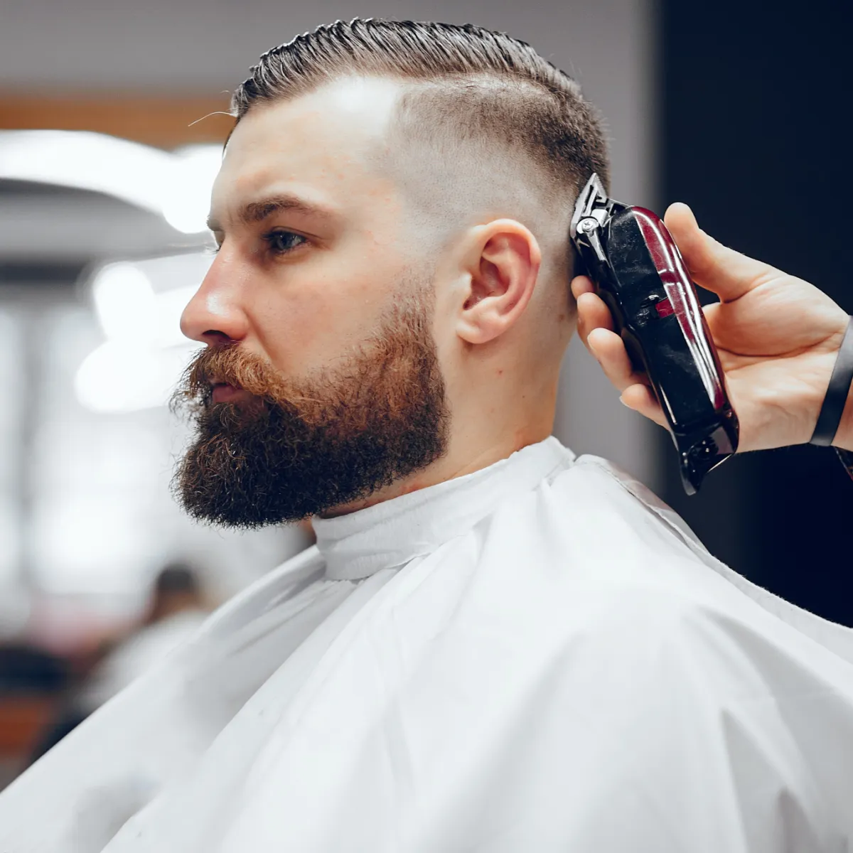 Men getting hair cut at Zoe Zimmerman's hair salon 