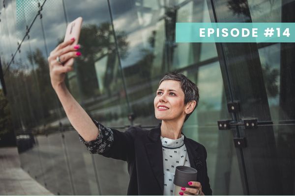 Business woman taking a selfie.