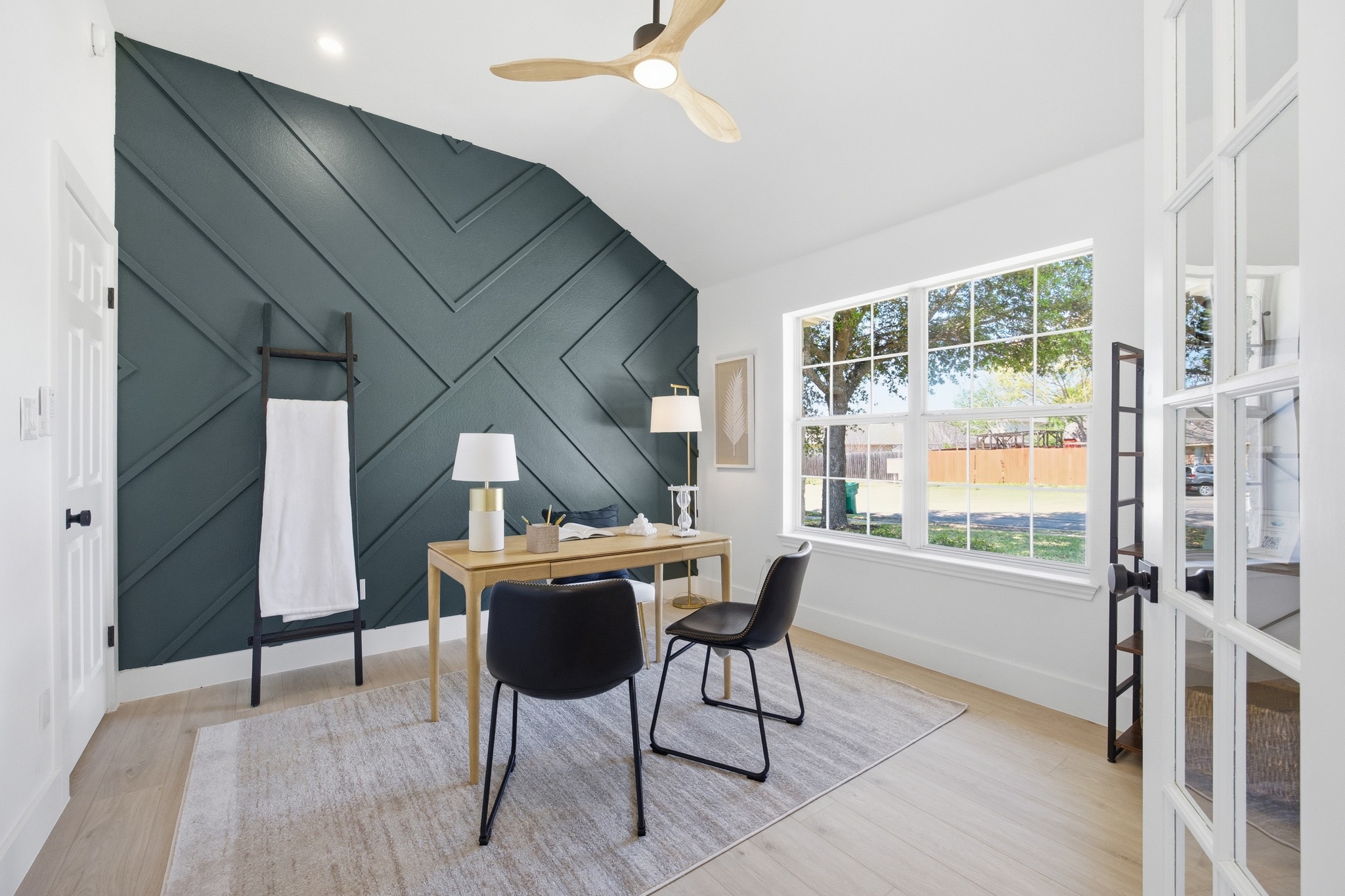 Commercial office interior renovation with high architectural finishes and modern lighting