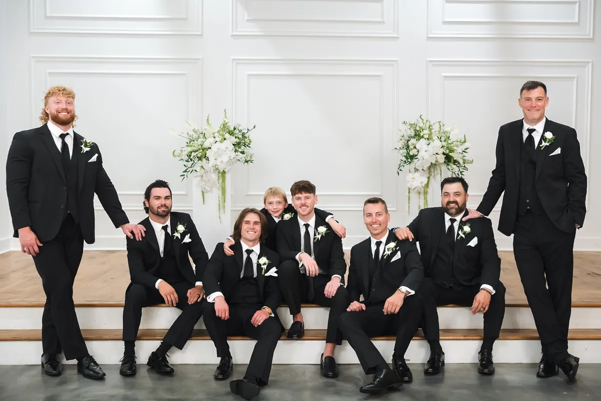 groomsmen-posing-with-ring-bearers