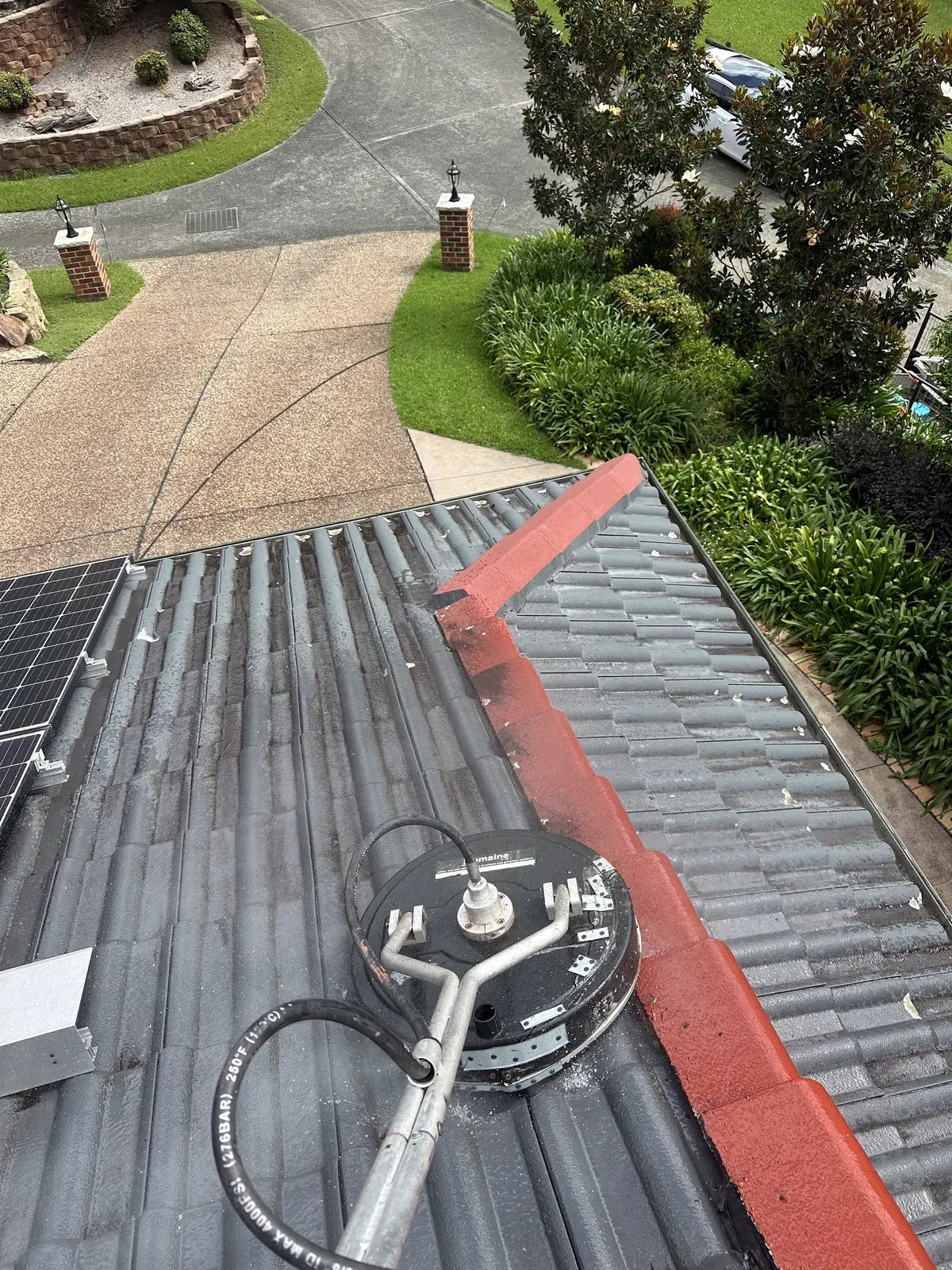 Concrete tile roof, cleaner line still showing