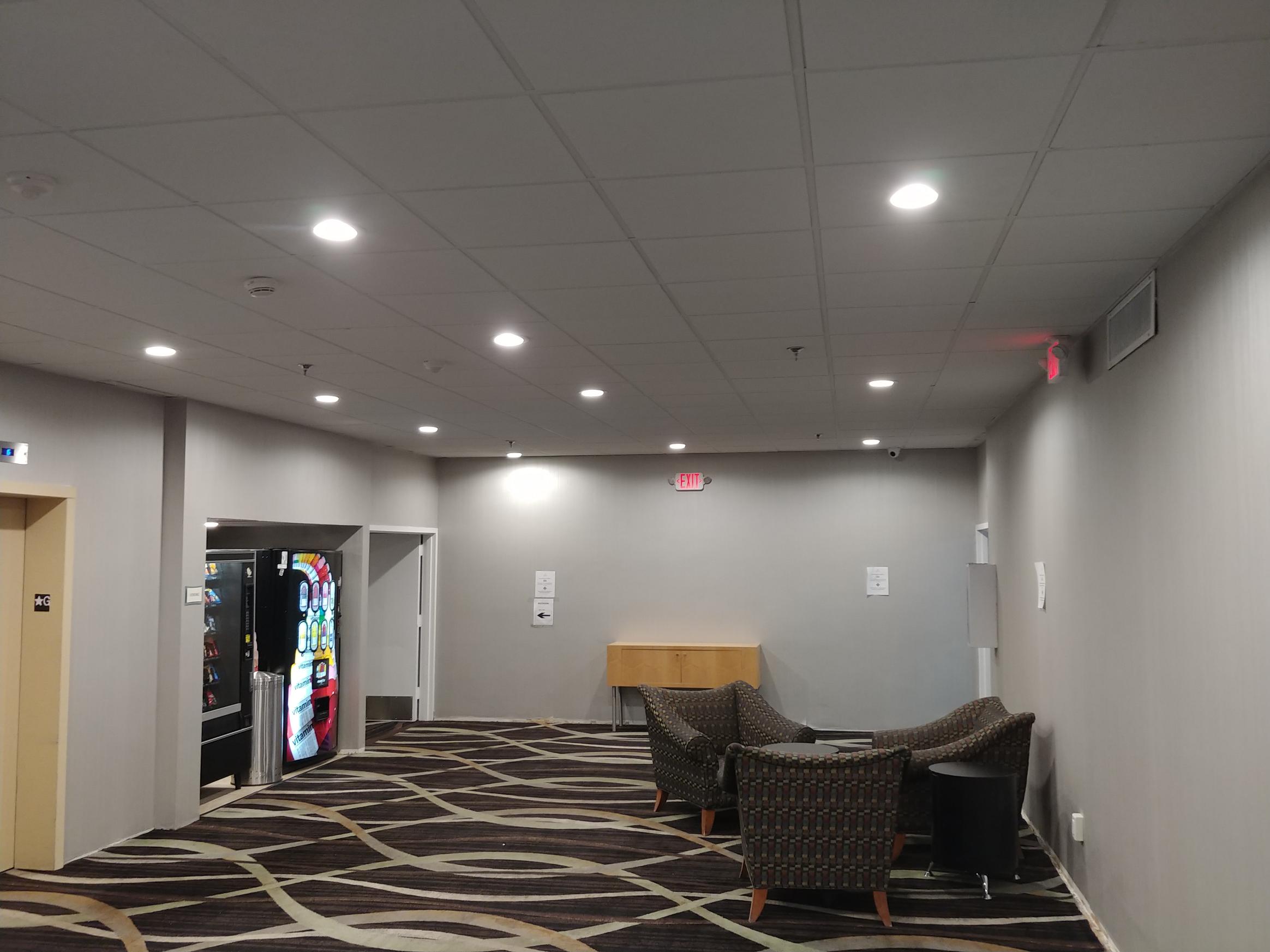 commercial recessed lighting installation in office lounge area Westchester NY