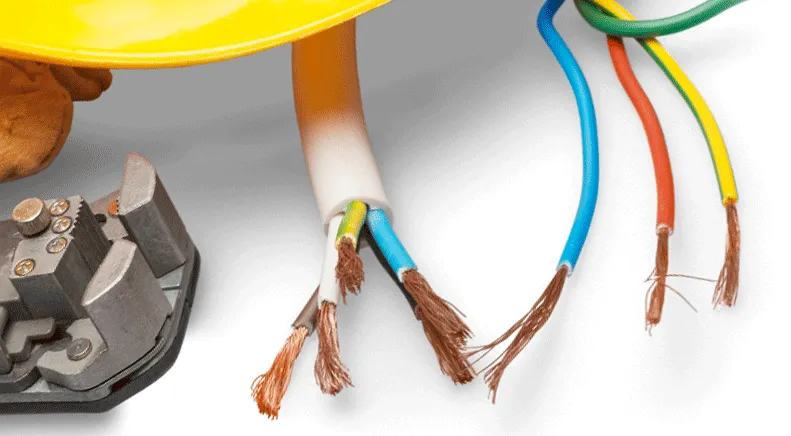 electrician installing new circuits during home rewiring NY