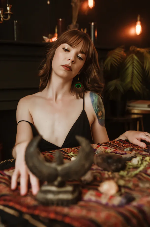 Portrait of Elara, soulful astrologer and coach