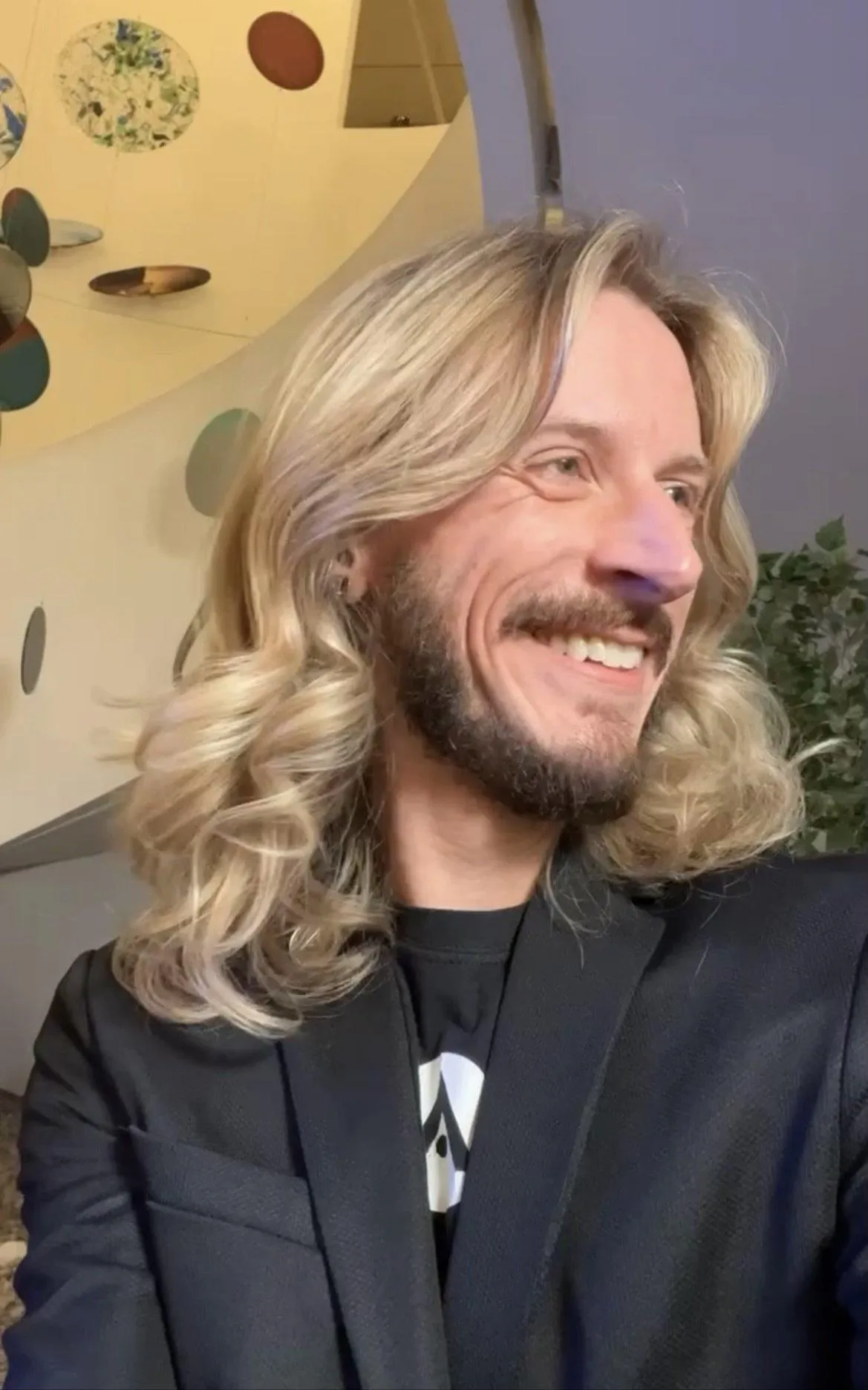 Portrait of Elara, soulful astrologer and coach