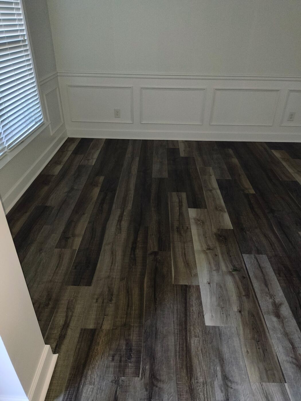 New plank flooring with fresh trim