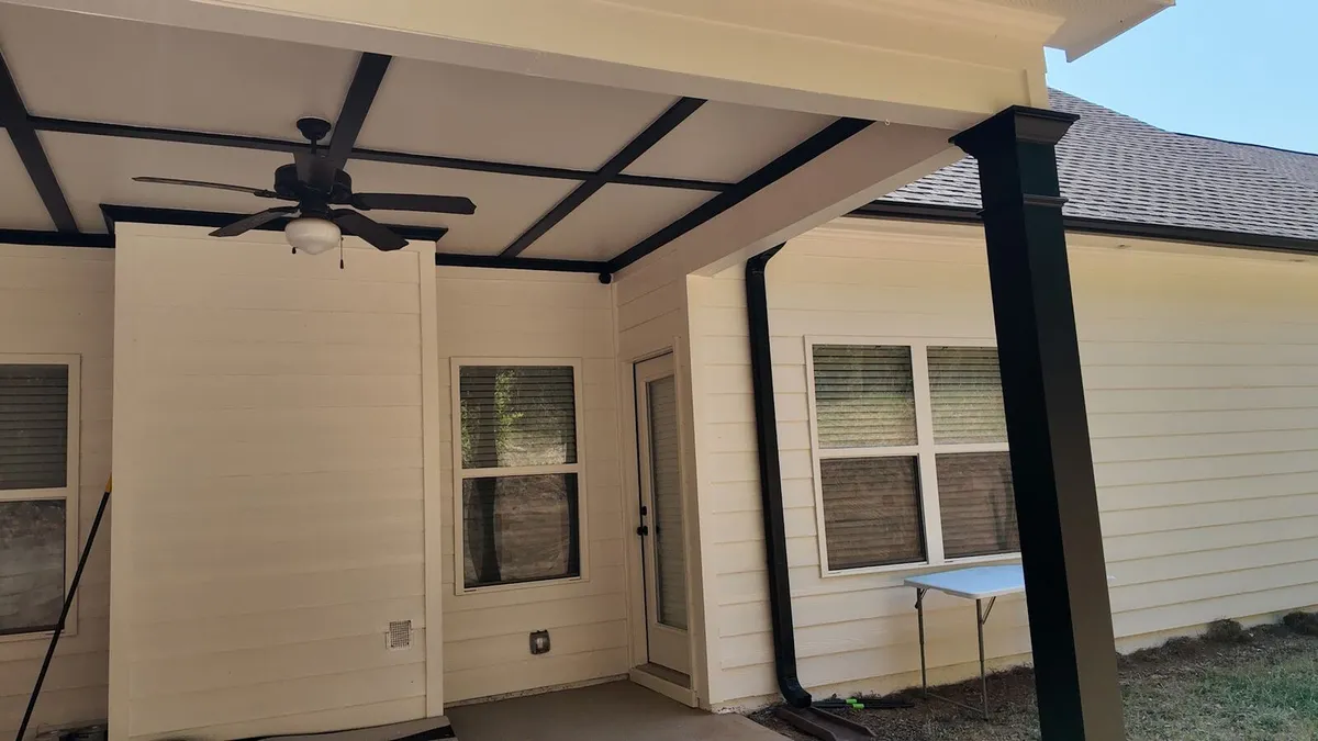 Back porch with black beams