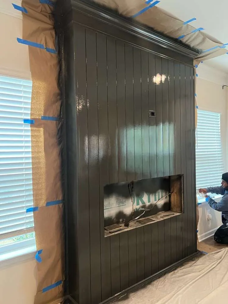 Black shiplap fireplace wall