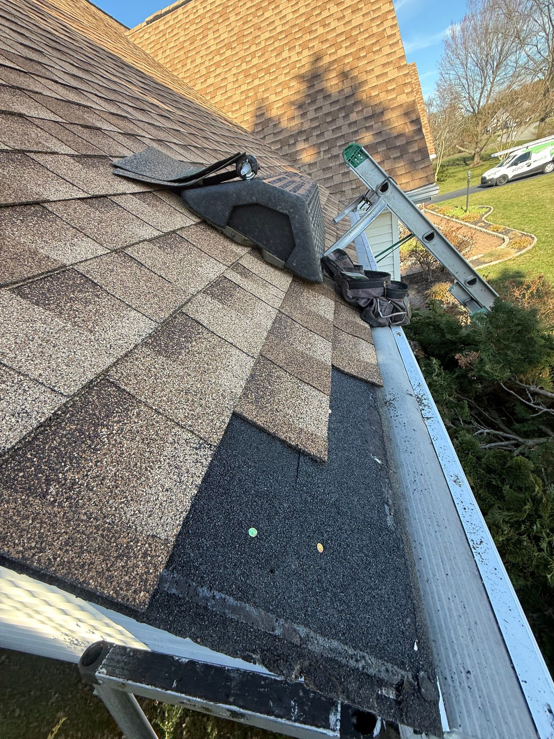Asphalt shingle roof repair in Lewes, DE by Platinum Roofs