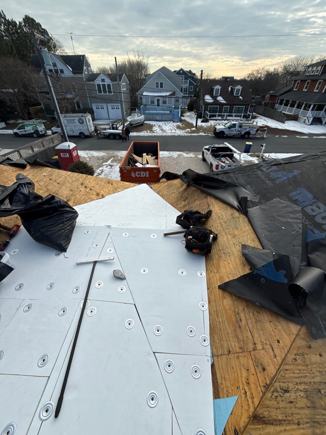 Roof repair in Lewes DE fixing leak damage on residential home