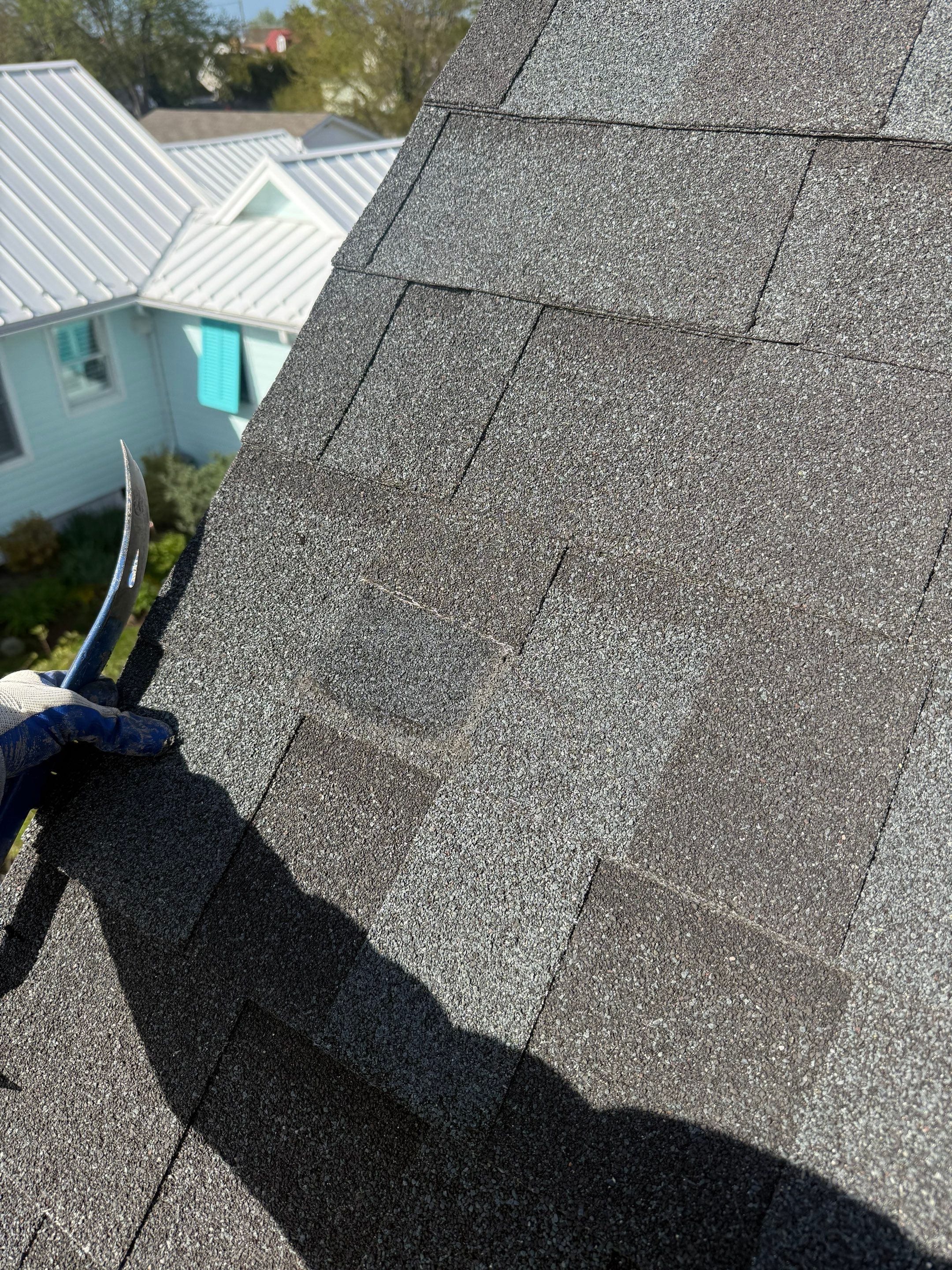 Roof inspection in Lewes DE checking residential roof condition