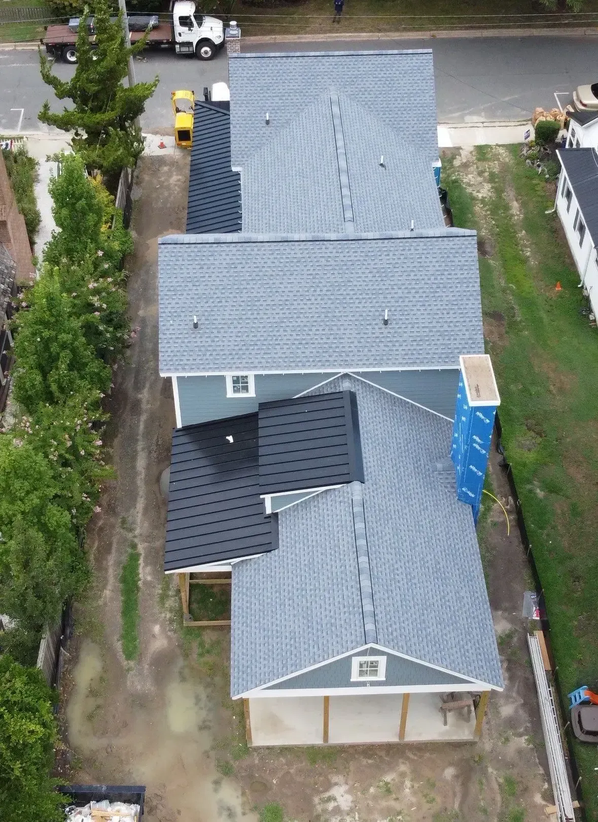 Platinum Roofs roofing team installing asphalt shingle roof on home in Lewes, DE