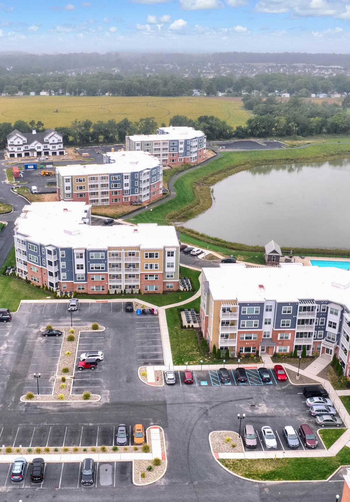 Aerial view of a multi-building commercial property with flat and low-slope roof sections