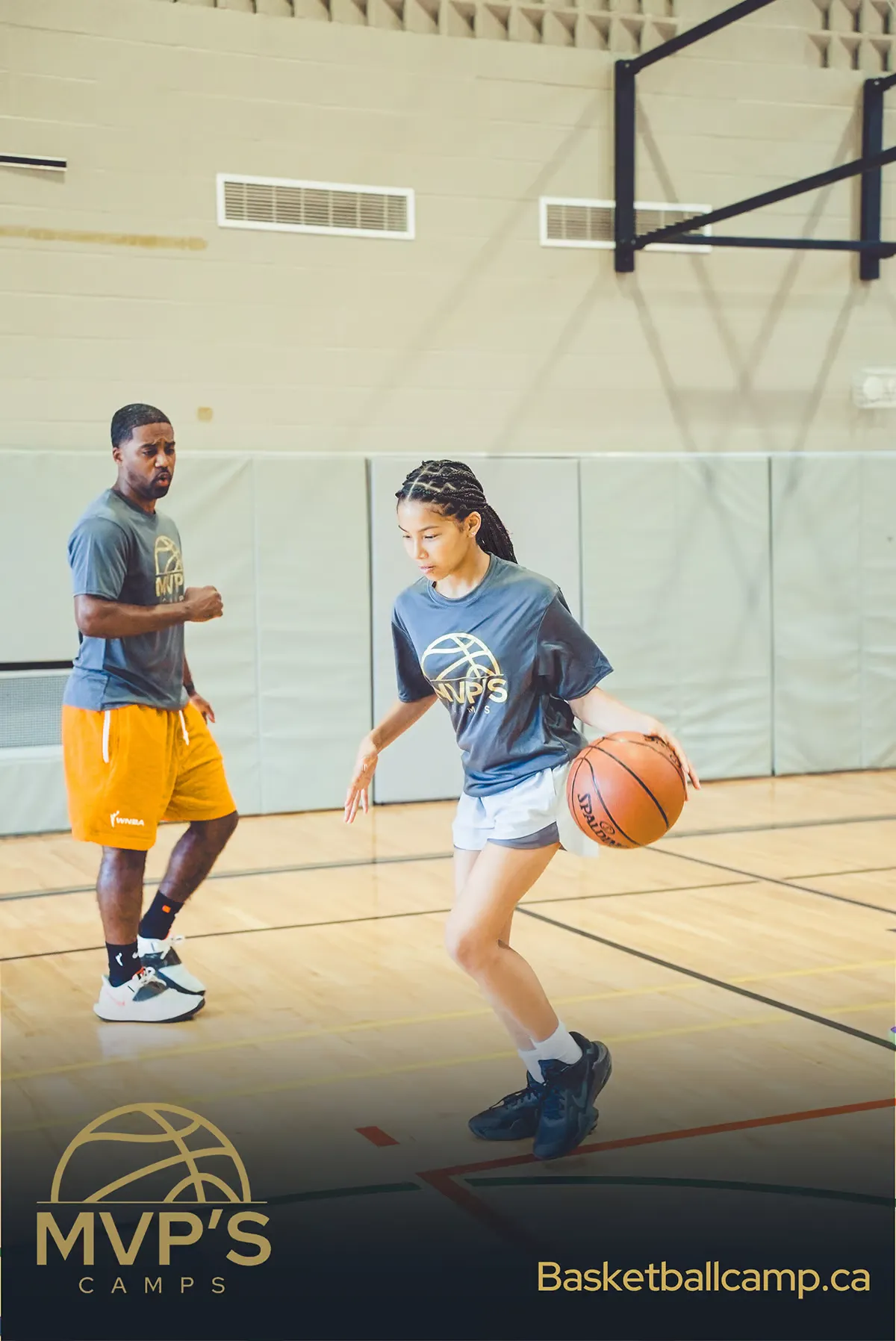 Advanced team training session developing championship-caliber basketball skills  Elite basketball players mastering team defensive strategies and formations  High-performance athletes executing complex offensive plays during intensive practice