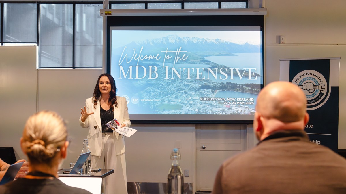 Rachael Evans presenting at the front of the MDB Intensive room in Queenstown