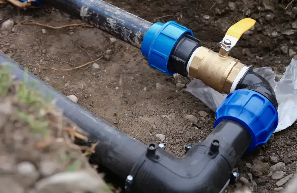 Underground water supply line with valve and pipe fittings